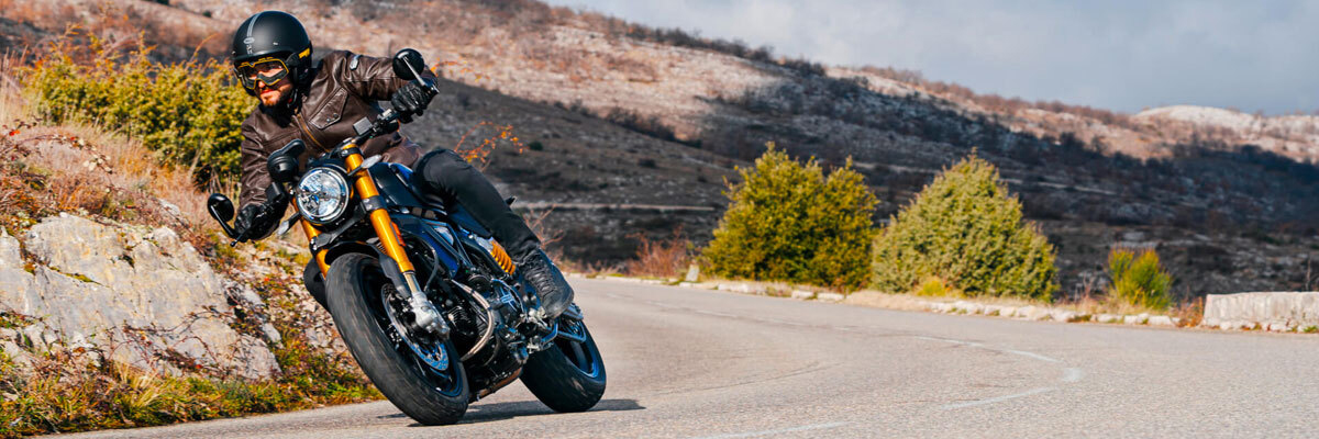 A BMW Motorcycle rider visiting waterfalls in Northern California.